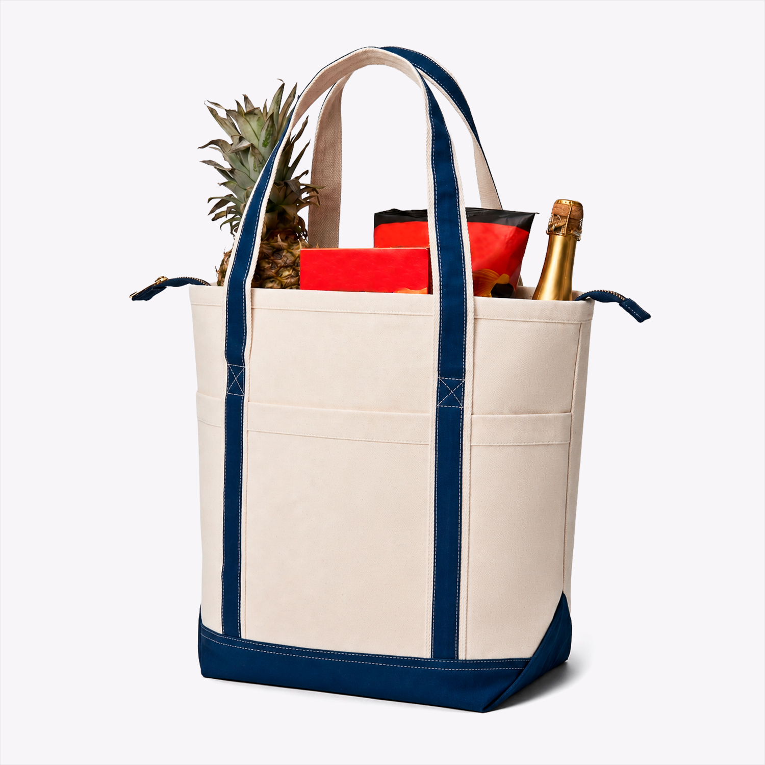 Ecorite canvas tote with navy trim, packed to show capacity - e-commerce packshot by Fisheye Studio Toronto